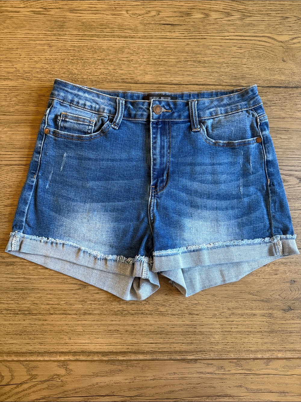 Judy Blue Distressed Rolled Hem Denim Shorts in Medium Blue